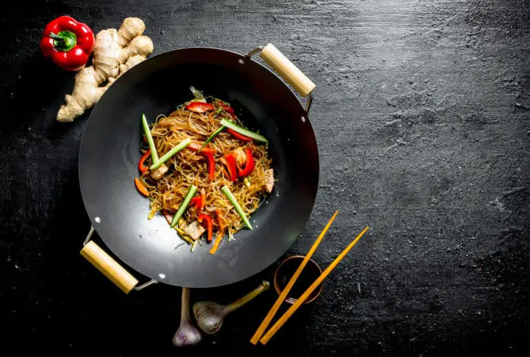 Carbon Steel vs cast iron wok