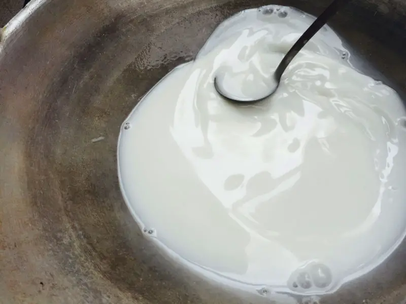 clean burnt milk from glass top stove