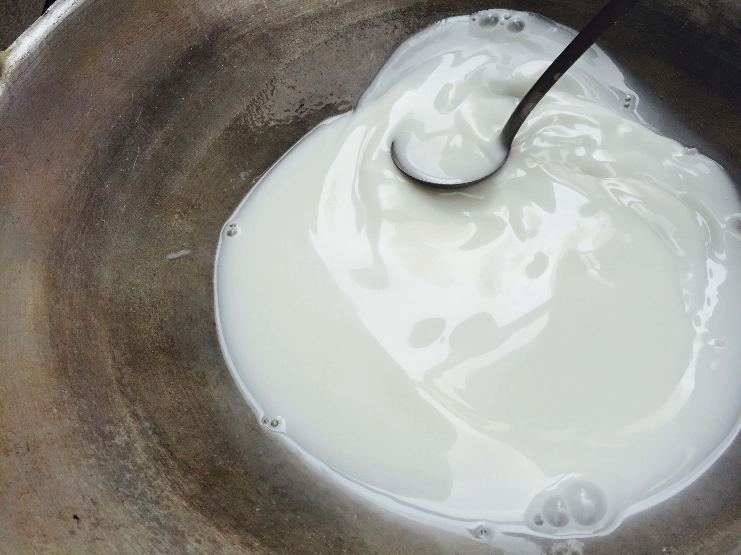 clean burnt milk from glass top stove